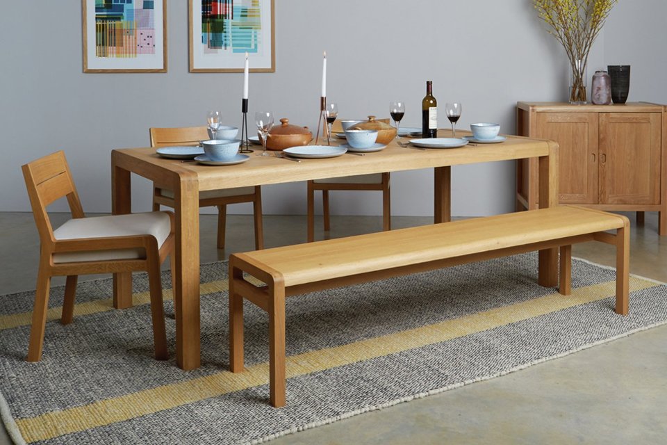 Habitat Radius solid oak 6 seater dining table.